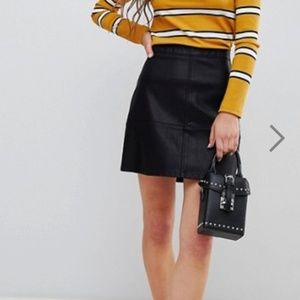 High-waisted leather mini skirt